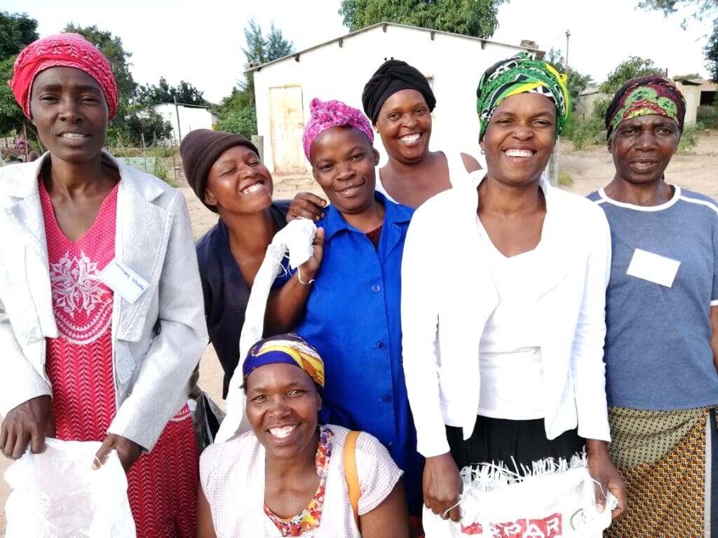 Group of woman posing for a photo smiling