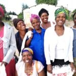 Group of woman posing for a photo smiling
