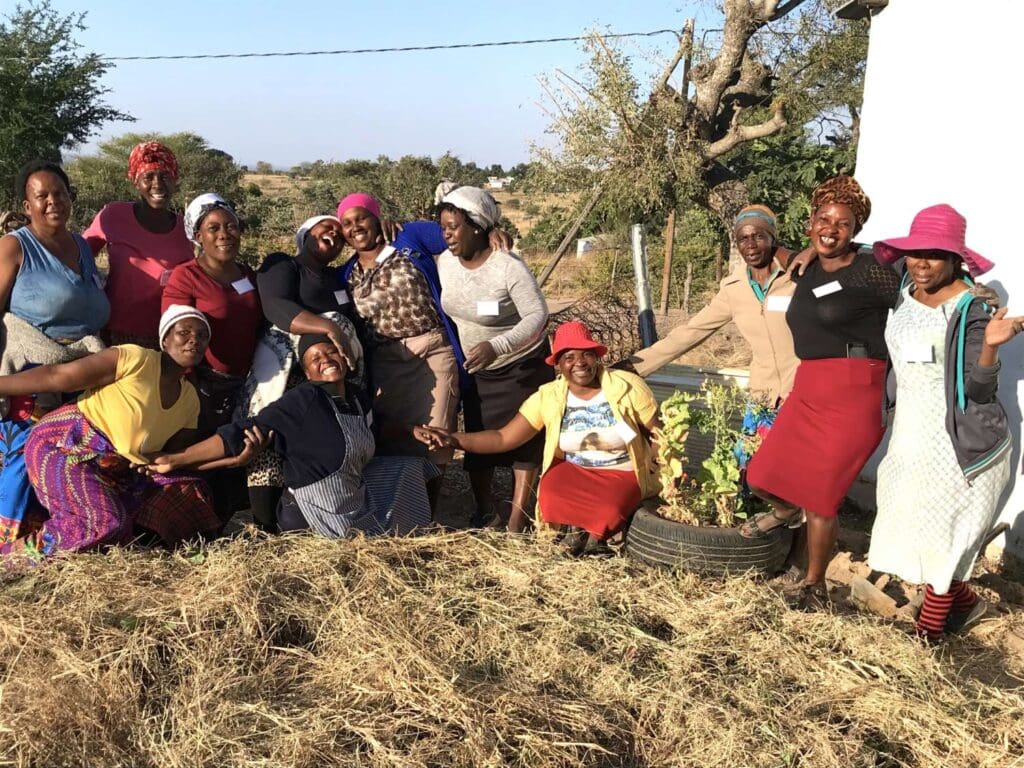 Group of woman working in the field posing