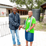 Woman and man shaking hands